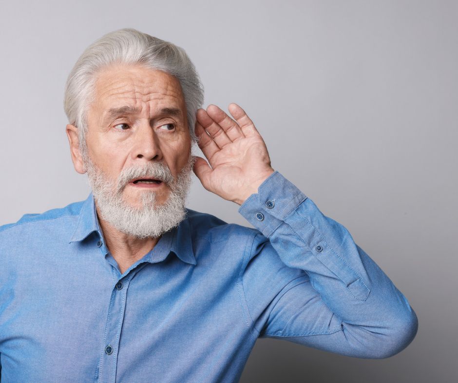 An old person facing hearing loss